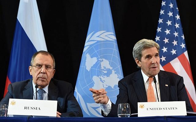 US Secretary of States John Kerry, right, gestures beside Russian Foreign Minister Sergey Lavrov during a news conference in Munich, southern Germany, on February 12, 2016. (AFP/Christof Stache)