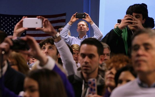 Campaign volunteers cheer and take photographs of Republican presidential candidate, Sen. Marco Rubio (R-FL) while he visits at his campaign headquarters February 8, 2016 in Manchester, New Hampshire. (Chip Somodevilla/Getty Images/AFP)