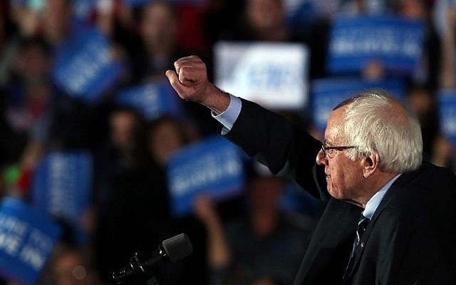 Senator Bernie Sanders speaks on stage after declaring victory over Hillary Clinton in the New Hampshire Primary on February 9, 2016 in Concord, New Hampshire (Spencer Platt/Getty Images/AFP)