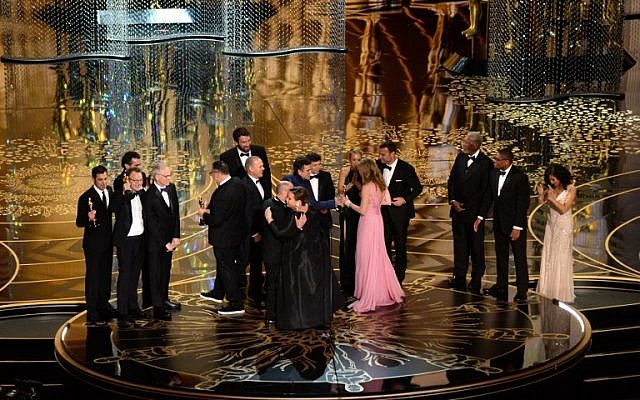 The cast of "Spotlight" accept the Best Motion Picture of the Year award onstage during the 88th Annual Academy Awards at the Dolby Theatre, February 28, 2016. (Kevin Winter/Getty Images/AFP)