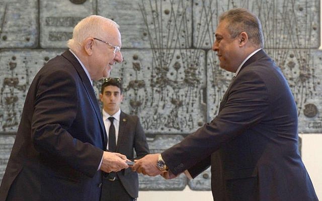 President Reuven Rivlin (L) with incoming Egyptian ambassador to Israel Hazem Khairat during a ceremony for new ambassadors at the President's Residence in Jerusalem, February 25, 2016. (Mark Neyman/GPO)