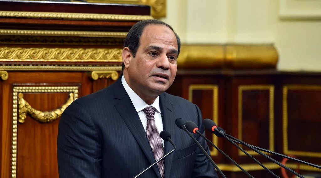 In this photo provided by Egypt's state news agency MENA, Egyptian President Abdel-Fattah el-Sissi, addresses parliament in Cairo, Egypt, Saturday, Feb. 13, 2016. (MENA via AP) 