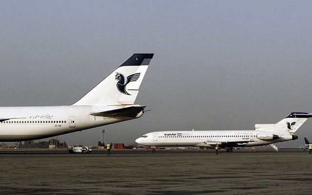 In this Sunday, March 2, 2008 photo, two passenger planes of Iran's national air carrier, Iran Air, are parked at the Mehrabad Airport in Tehran, Iran. (AP Photo/Vahid Salemi)