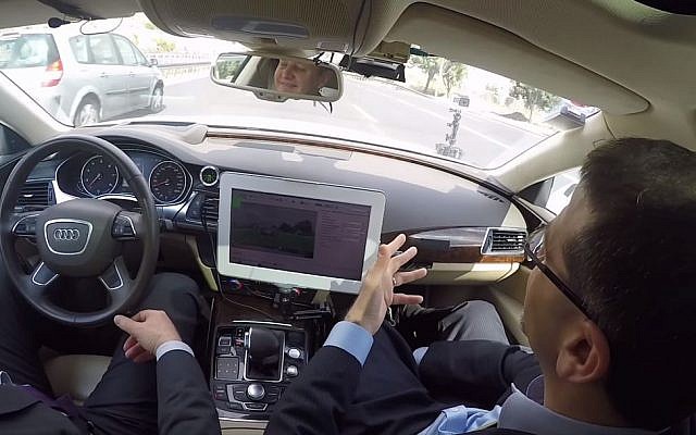 Former US ambassador to Israel Dan Shapiro takes a ride in Israeli MobilEye's self-driving car (YouTube screen capture)