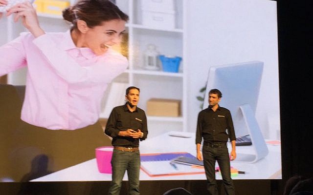 OwnBackup CEO Sam Gutmann (L) and Vice President Ori Yankelev on stage at the Microsoft Ventures Accelerator Israel Demo Day, Februeary 5, 2016 (Courtesy)