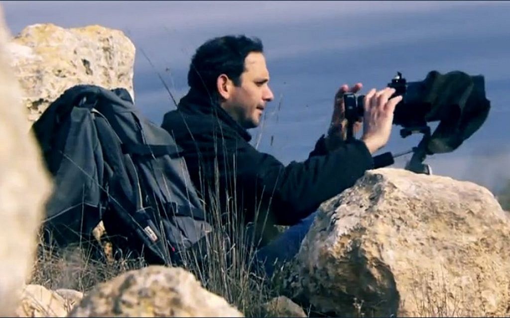 Gilad Ach, director of the right-wing 'Ad Kan' organization, in the West Bank (screen capture: Channel 2/Uvda)