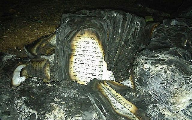 The remains of Torah scrolls set alight at the Givat Sorek outpost in the West Bank on February 6, 2016 (Courtesy: Karmei Tzur security department)