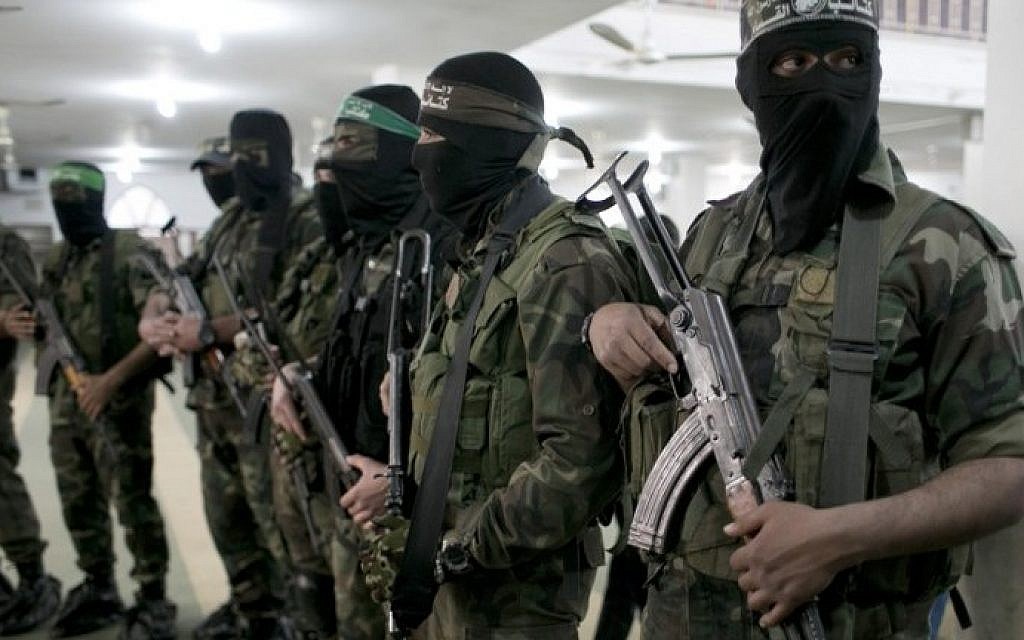 Hamas members at a funeral in the southern Gaza Strip on March 4, 2016. (AFP/SAID KHATIB)