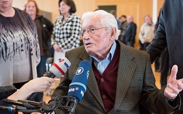 Former SS guard Jakob Wendel gives interviews after a day of hearings at a trial against a former Auschwitz guard at the court in Detmold, western Germany, on March 11, 2016. (AFP / dpa POOL / Bernd Thissen)