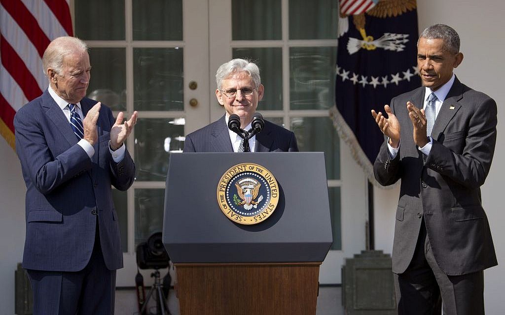 Federal appeals court judge Merrick Garland receives applauds from President Barack Obama and Vice President Joe Biden as he is introduced as Obama's nominee for the Supreme Court during an announcement in the Rose Garden of the White House, in Washington, Wednesday, March 16, 2016. (AP/Pablo Martinez Monsivais)