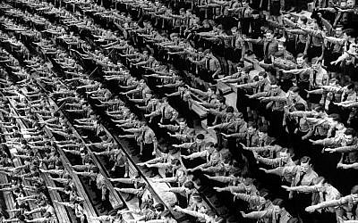 An Associated Press photograph shows some of over 132,000 members of the Hitler youth assembled at the Olympic Stadium in Berlin, Germany on May 1, 1939 (AP Photo)