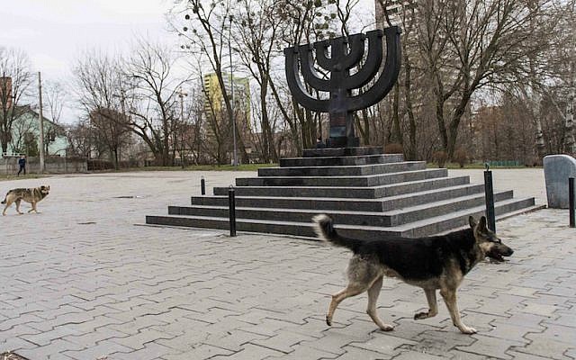 Stray dogs roam the Babi Yar monument on March 14, 2016 in Kiev, where Nazis and local collaborators murdered 30,000 Jews in 1941. (Cnaan Liphshiz/JTA)