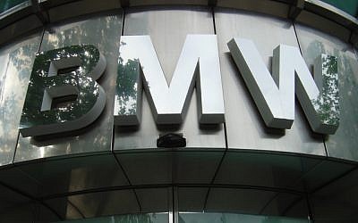 A BMW logo over a Berlin showroom (CC BY Mangan 2002, Wikimedia Commons)