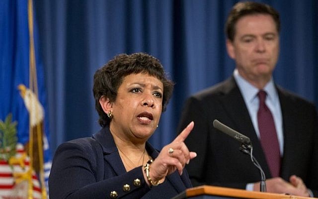 File: Attorney General Loretta Lynch, accompanied by FBI Director James Comey, speaks during a news conference at the Justice Department in Washington, Thursday, March 24, 2016. (AP Photo/Jacquelyn Martin)