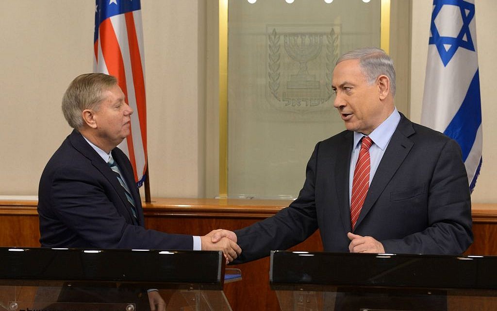 Prime Minister Benjamin Netanyahu meets with US senator Senator Lindsey Graham in Jerusalem during a previous visit by Graham on December 27, 2014 (Amos Ben Gershom/GPO)