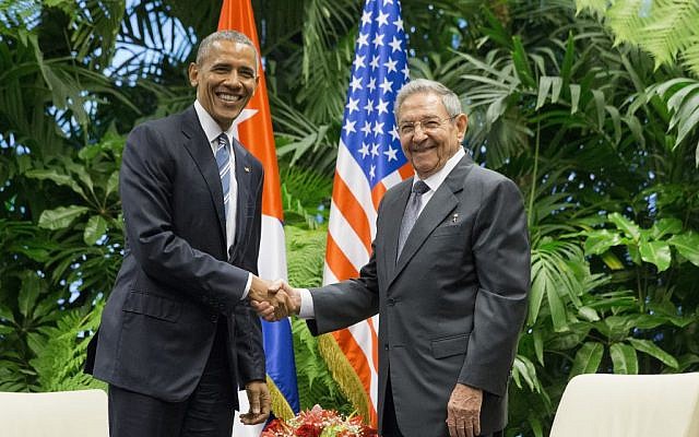 President Barack Obama, left, shakes hands with Cuban President Raul Castro during their meeting at the Palace of the Revolution, in Havana, Cuba, March 21. (AP/Pablo Martinez Monsivais)