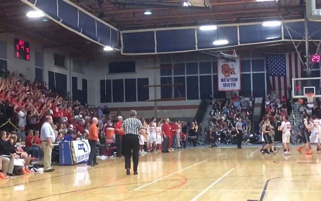 Fans of Catholic Memorial School cheer at a game with Newton North High School in suburban Boston on March 11, 2016. During the basketball game, CMS fans chanted, 'You killed Jesus,' at the predominantly Jewish high school. (Screen Capture: Nate Weitzer/Twitter)