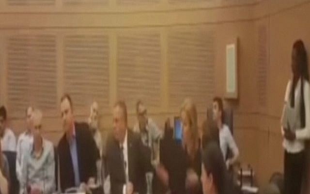 Zionist Union MKs (Erel Margalit (3rd left) and Tzipi Livni (5th left) argue during a faction meeting at the Knesset on March 7, 2016 (screen capture: Channel 2)