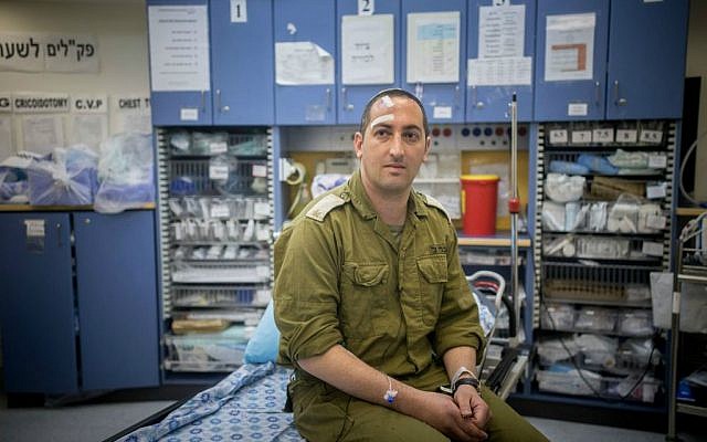Roee Harel, victim of the attack in Eli, is seen at the Shaare Zedek Medical Center in Jerusalem on March 2, 2016. (Yonatan Sindel/Flash90)