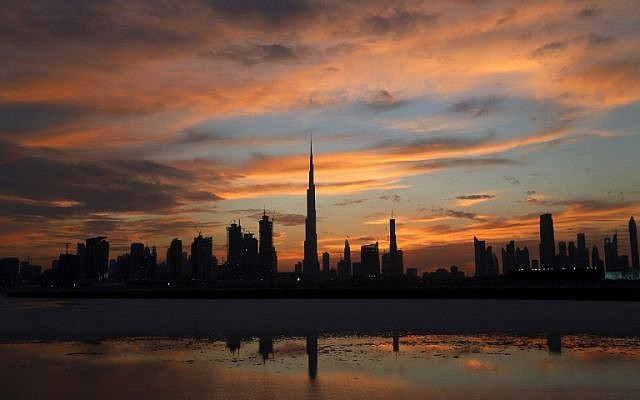 A photo of Dubai's skyline with Burj Khalifa, the world's tallest tower in the center, as the sun sets over Dubai, United Arab Emirates, on April 4, 2016. (AFP/Karim Sahib)