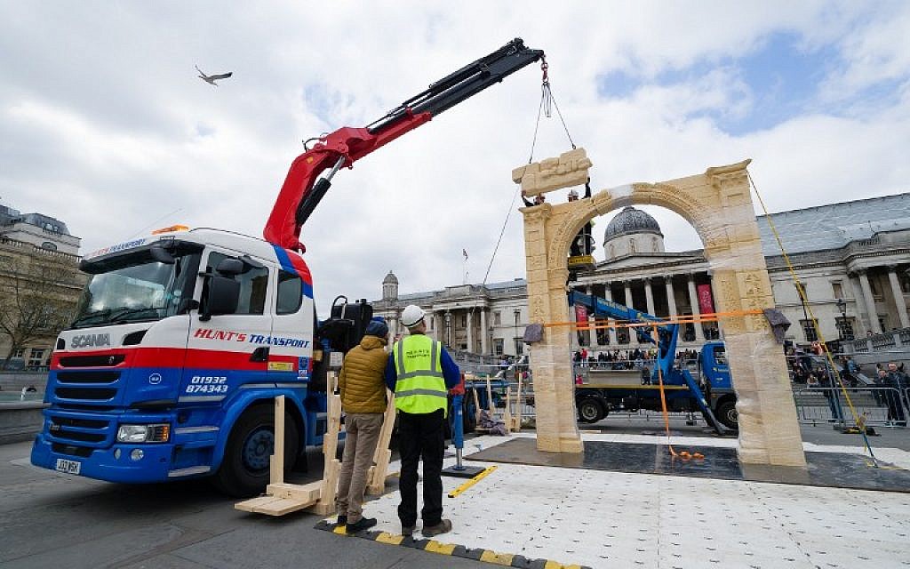 A replica of Palmyra's Arch of Triumph is erected in Trafalgar Square, central London, on 18 April 2016.
The original arch was destroyed by the Islamic State group (IS) and the replica has been crafted using the latest 3D printing and carving technologies by the Institute for Digital Archaeology. (AFP PHOTO / LEON NEAL)