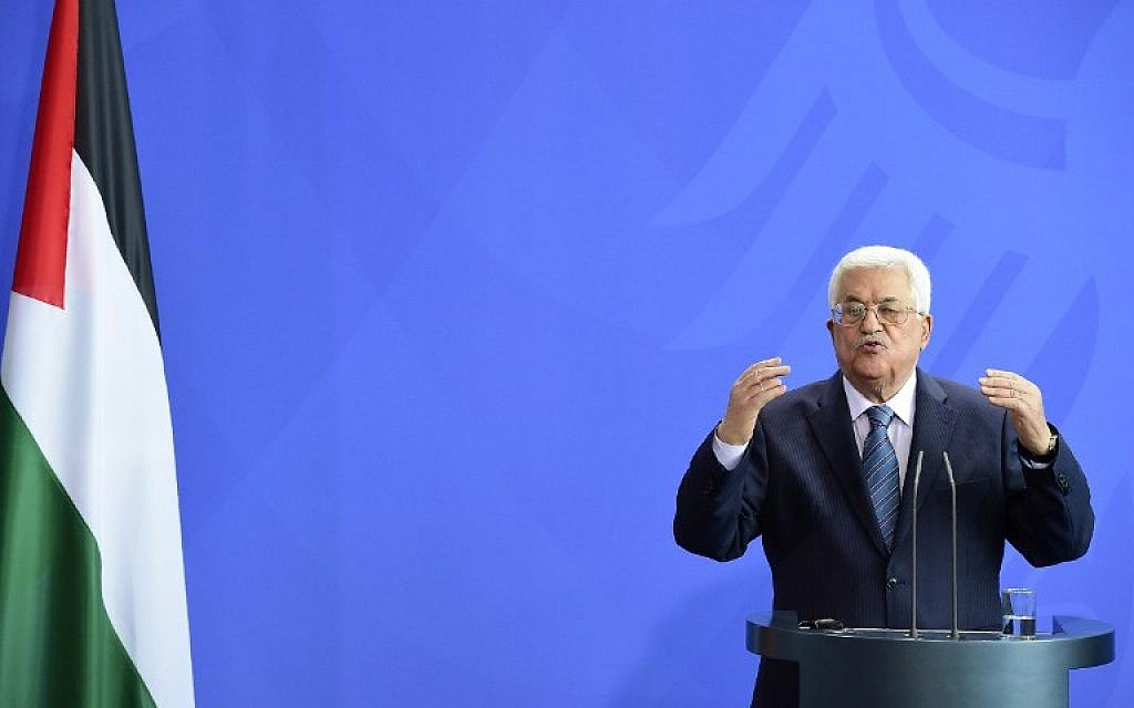 Palestinian Authority President Mahmoud Abbas speaks during a press conference after a meeting with German Chancellor Angela Merkel on April 19, 2016 at the chancellery in Berlin. (AFP PHOTO / TOBIAS SCHWARZ)