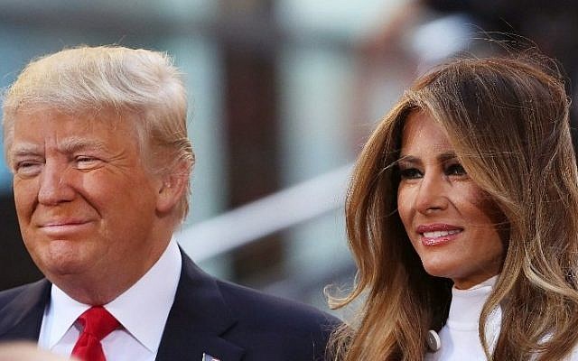Republican presidential candidate Donald Trump sits with his wife Melania Trump while appearing at an NBC Town Hall at the Today Show on April 21, 2016 in New York City. (Spencer Platt/Getty Images/AFP)