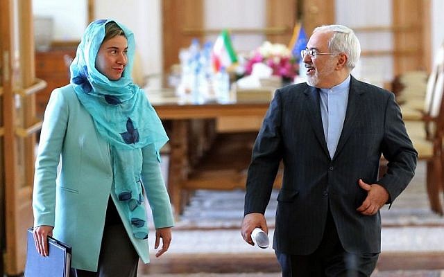 Iranian Foreign Minister Mohammad Javad Zarif, right, and European Union foreign policy chief Federica Mogherini after their meeting, in Tehran, Iran, April 16, 2016.  (AP /Ebrahim Noroozi)