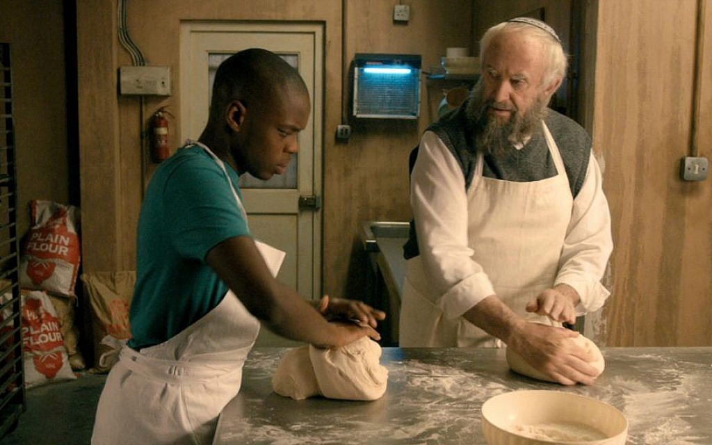 Jonathan Pryce (right) as a Jewish baker, and Jerome Holder as his apprentice in 'Dough' (Menemsha Films)