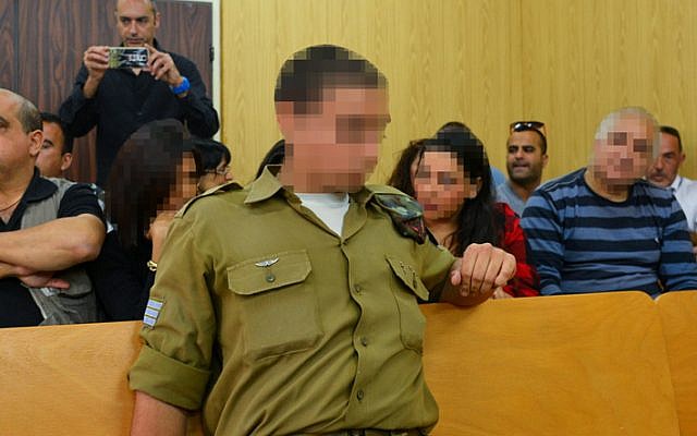 An Israeli soldier who shot a Palestinian assailant in Hebron sits in a military court hearing in Tel Aviv, April 5, 2016. (Flash90)
