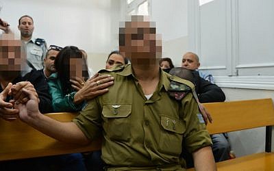The Israeli soldier who shot a Palestinian assailant in Hebron arrives for a court hearing at a military court in Jaffa, April 14, 2016. (Flash90)