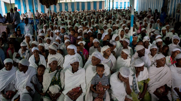 Members of the Falash Mura Jewish Ethiopian community wait for prayer service before attending the Passover seder meal, in the synagogue in Gondar, Ethiopia, April 22, 2016 (Miriam Alster/FLASH90)