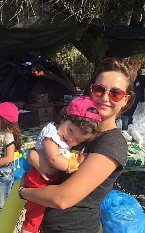 Actress Milana Vayntrub, the 'AT&T Girl,' volunteering with Syrian refugees in Lesbos, Greece. (Courtesy of Vayntrub/Can't Do Nothing)