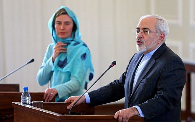File: Iranian Foreign Minister Mohammad Javad Zarif, right, and the European Union foreign policy chief Federica Mogherini arrive to attend a press briefing after their meeting, in Tehran, Iran, Saturday, April 16, 2016.  (AP/Ebrahim Noroozi)