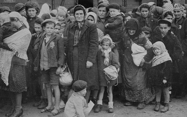 Jewish women and children from Subcarpathian Rus await selection on the ramp at Auschwitz-Birkenau, May 1944. (United States Holocaust Memorial Museum, courtesy of Yad Vashem [Public Domain])
