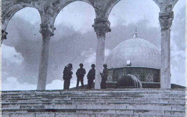 Israeli soldiers guard the Dome of the Rock, the site of the Temple's Holy of Holies, following the Six Day War. (The Temple Institute)