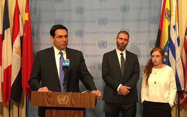Israel's Ambassador to the UN Danny Danon, with Nathan Meir, whose wife Dafna was murdered by a Palestinian terrorist in January, and their daughter Renana, April 18, 2016. (Courtesy)