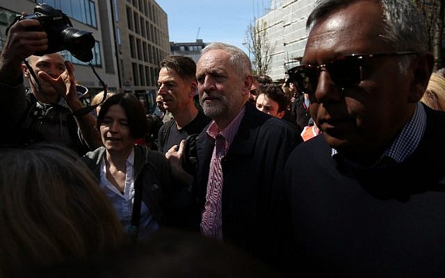 Britain's opposition Labour Party leader Jeremy Corbyn, center, after a speech at a May Day rally in London on May 1, 2016. (AFP/Justin Tallis)