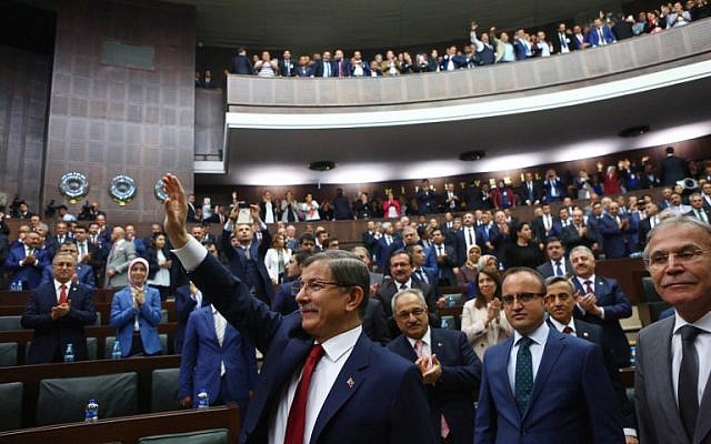 Turkish Prime Minister and leader of Turkey's ruling Justice and Development Party (AKP) Ahmet Davutoglu arrives for an AKP group meeting at the Turkish parliament in Ankara, May 3, 2016. (AFP Photo/Adem Altan)
