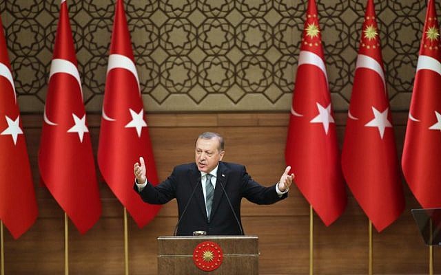 Turkish President Tayyip Erdogan gestures during a speech with local village and town leaders at the Presidential Palace in Ankara, on May 4, 2016. (AFP/Adem Altan)