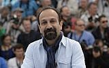 This file photo taken on May 17, 2013 shows Iranian director Asghar Farhadi posing during a photocall for his film 'The Past' at the 66th Cannes Film Festival in Cannes, France. (Anne-Christine Poujoulat/AFP)