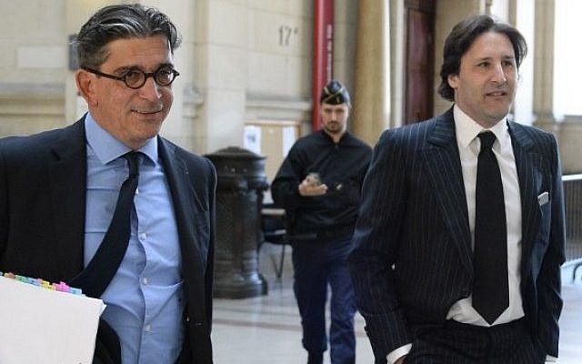 Arnaud Mimran (right) and his lawyer Jean-Marc Fedida (left), arrive at the Paris courthouse on May 25, 2016. (AFP/Bertrand Guay)
