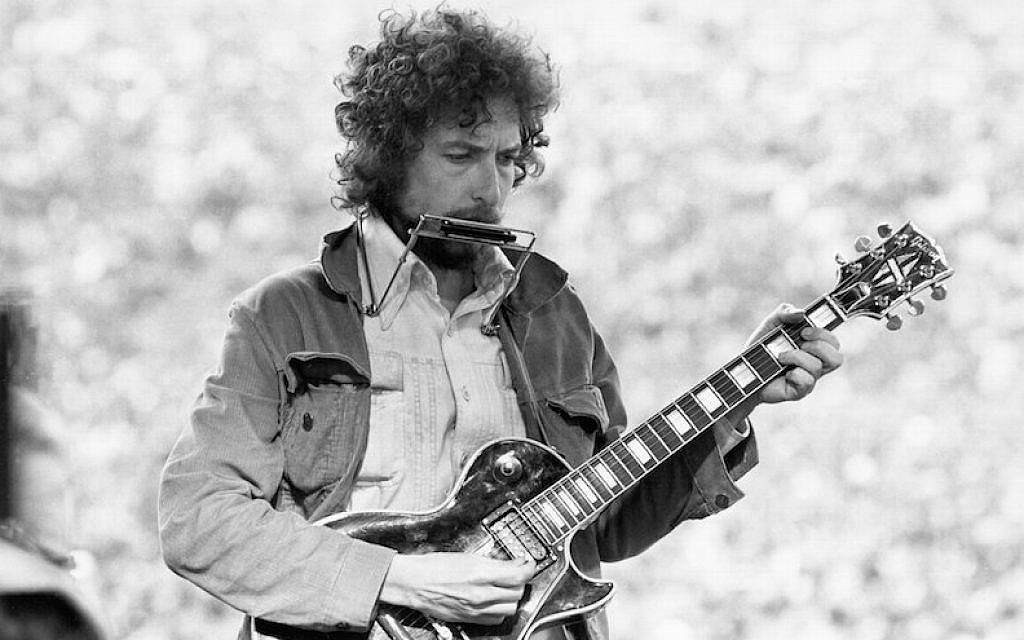 Bob Dylan performing at the Kezar Stadium in San Francisco, March 23, 1975. (Alvan Meyerowitz/Michael Ochs Archives/Getty Images via JTA)