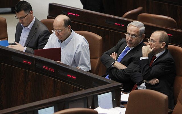 Former interior minister Gideon Saar (L), former defense minister Moshe Ya'alon (2L), Prime Minister Benjamin Netanyahu (2R) and former  energy minister Silvan Shalom in the Knesset on May 1, 2013. (Miriam Alster/FLASH90)
