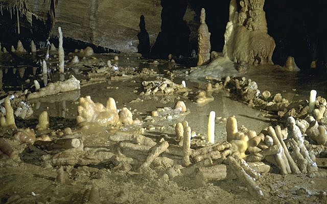 This is an undated image released by CNRS on Wednesday May 25, 2016 of stone rings believed to have been built by Neanderthals inside a cave in Bruniquel, France. (Michel Soulier/CNRS via AP)