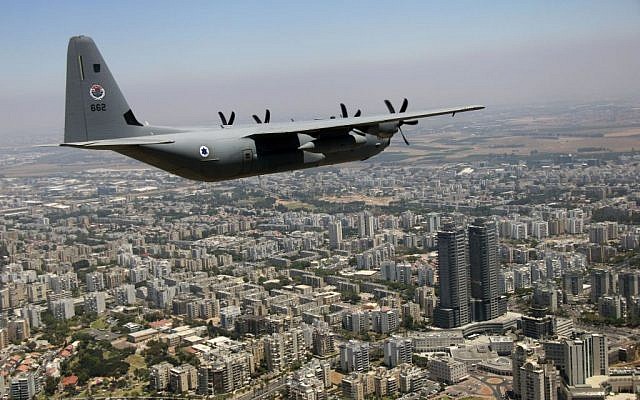 A C-130J Super Hercules flies over the city of Ashdod as part of the Israeli Air Force's annual flyby on Independence Day, May 12, 2016. (Judah Ari Gross/Times of Israel)