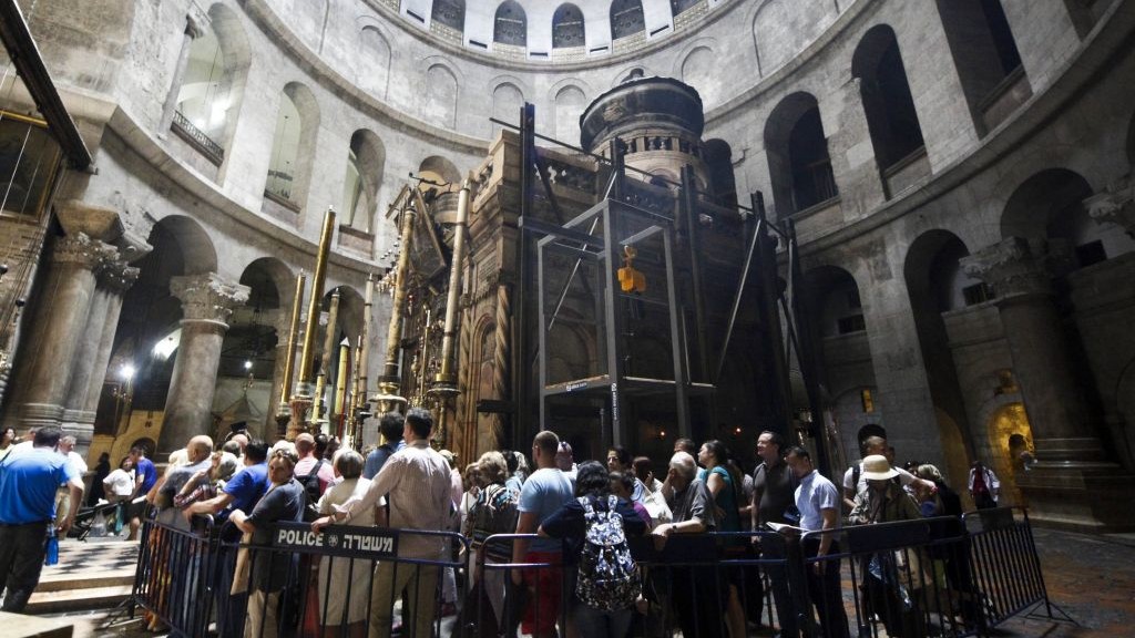 Christian pilgrims wait in line to visit the tomb of Jesus in the Church of Holy Sepulchre in Jerusalem Friday, May 20, 2016. (AP Photo/Mahmoud Illean)