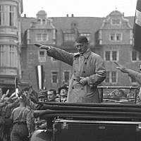 Adolf Hitler at a Nazi rally in Weimar, Germany, October 1930 (public domain)