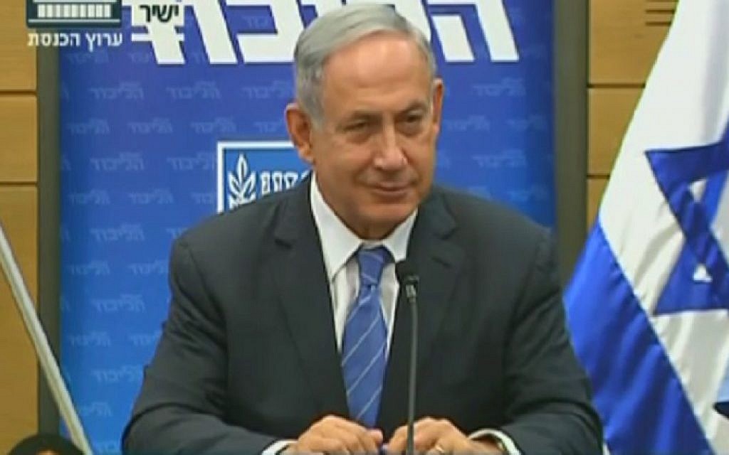 Prime Minister Benjamin Netanyahu speaks to reporters at a meeting of his Likud faction at the Knesset on May 23, 2016 (screen capture: Knesset Channel)