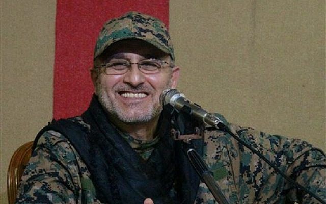 This undated handout image released on Friday, May 13, 2016, by Hezbollah Media Department, shows slain top military commander Mustafa Badreddine smiling during a meeting. (Hezbollah Media Department via AP)
